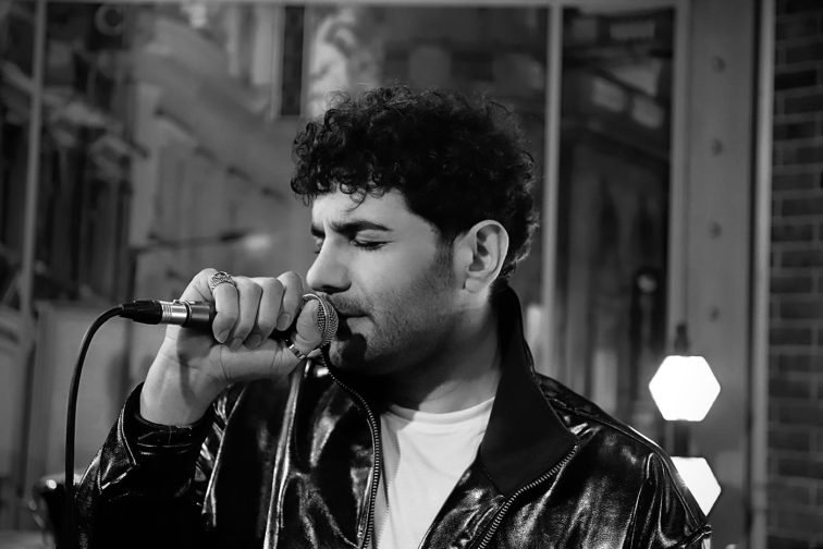 Mehran Rakhshandeh - Persian singer and musician based in the UK, known for his soulful voice and modern Persian music.
